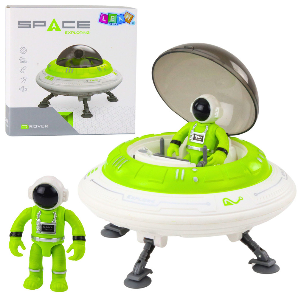 UFO űrhajó zöld űrhajósfigurával, fénnyel és hanggal