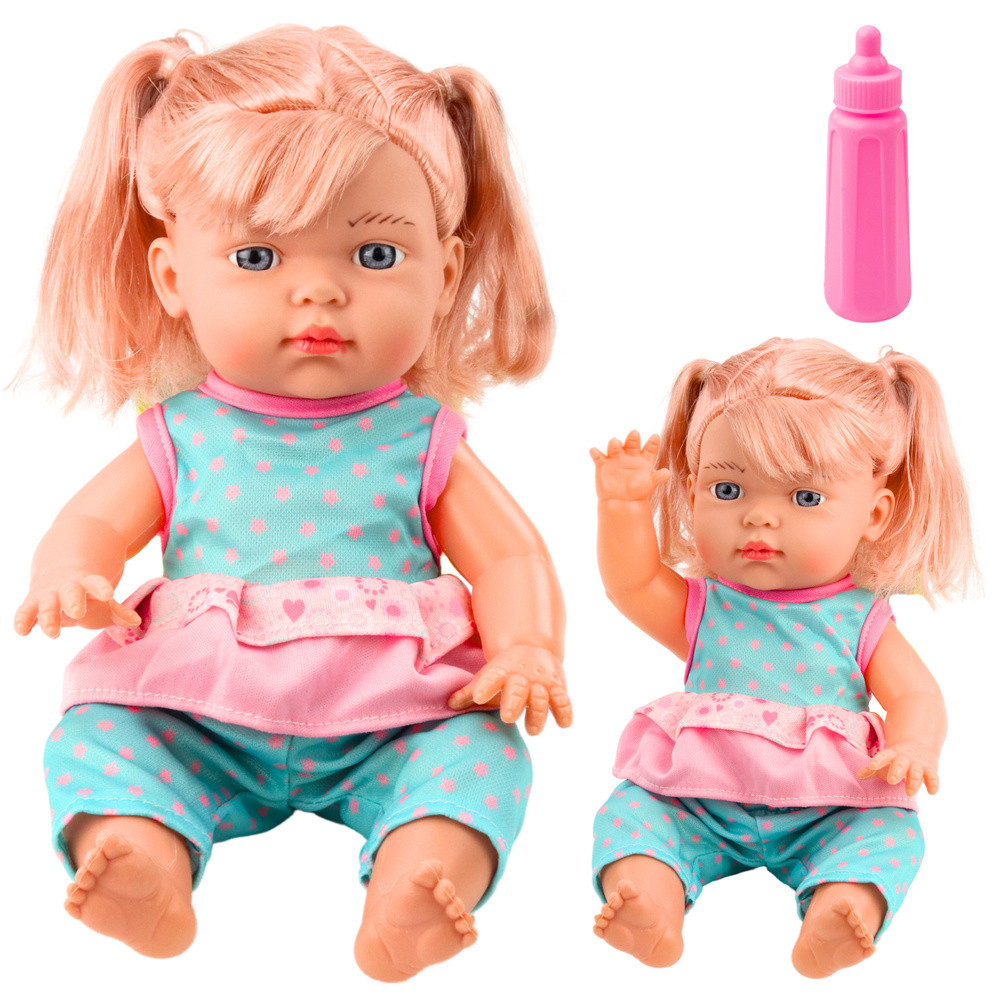 Hangot adó csecsemőbaba türkiz ruhában, cumisüveggel – 30 cm