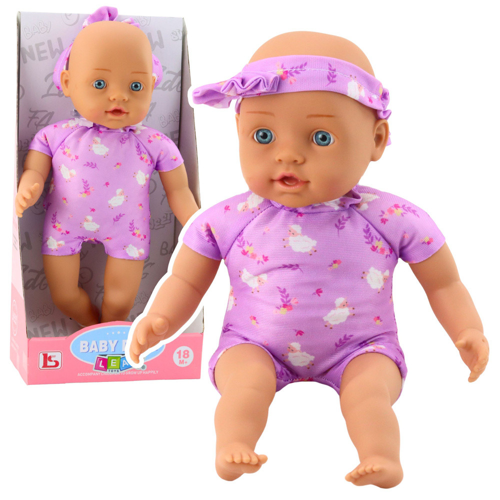 Csecsemőbaba lila virágos bodyban, masnis fejpánttal – 31 cm