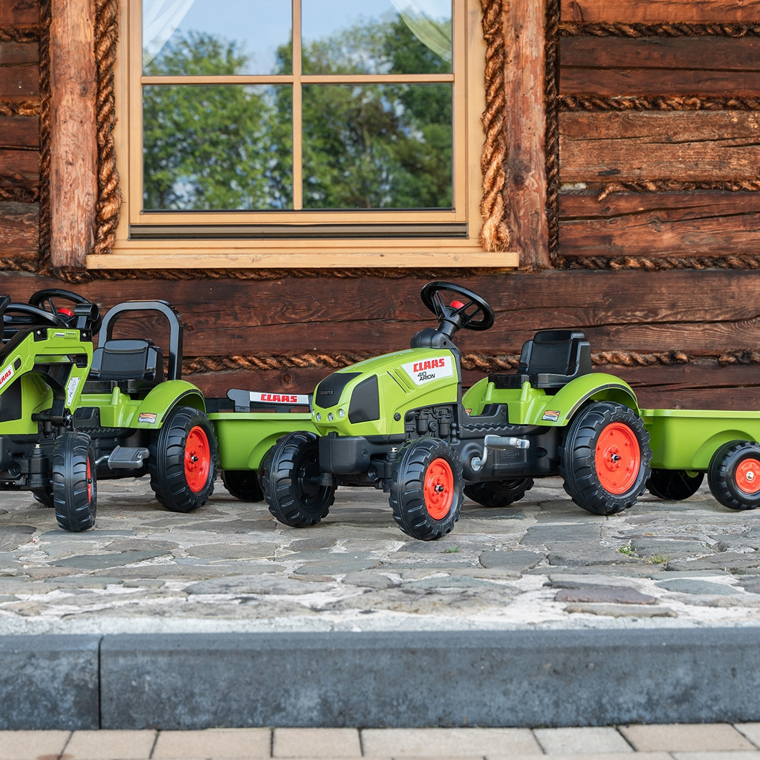 FALK zöld Claas Arion pedálos traktor pótkocsival, 2 éves kortól