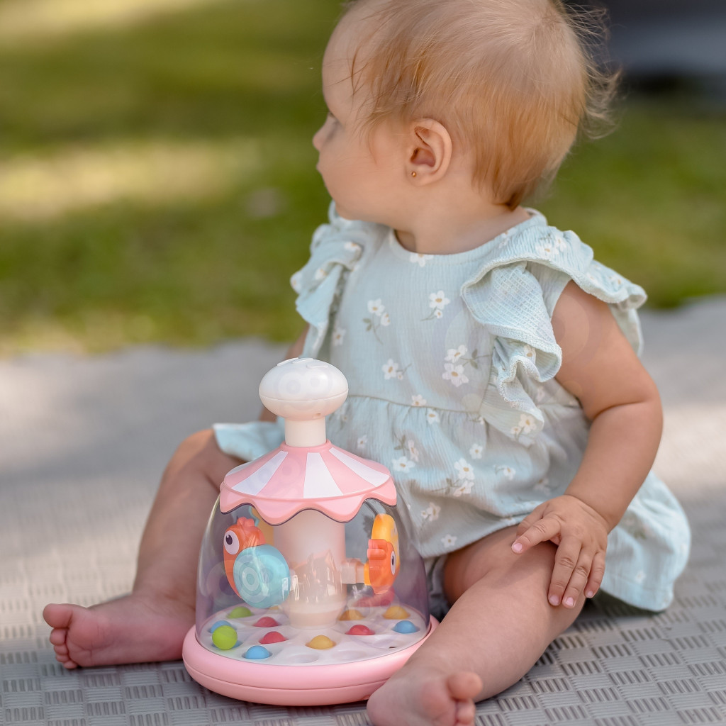 WOOPIE BABY rózsaszín pörgő búgócsiga színes állatokkal és golyókkal